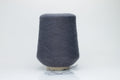 Soft, heathered gray luxury yarn, gently twisted, with a delicate alpaca halo and a subtle matte sheen, ready for knitting.
